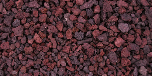 Detalhe da textura de puzolana Bagston, um agregado vulcânico ideal para cobertura de solos, conservação da humidade e decoração paisagística.