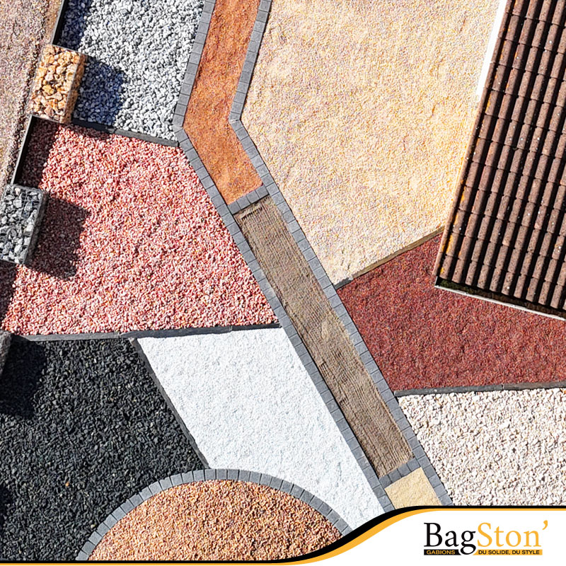 Exposição de variedades de agregados e pedras decorativas Bagston, destacando a diversidade de cores e texturas disponíveis para projetos de paisagismo e estabilização exterior.